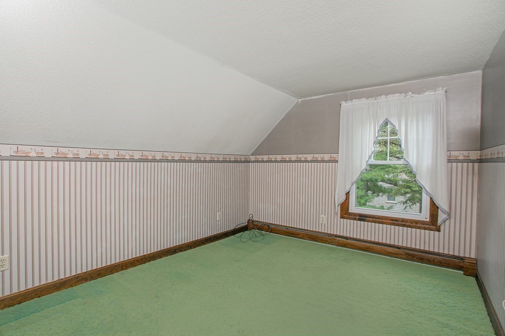 36 Morton Road Freetown, MA 02717 - Photo 31 of 40 a view of room with window and stairs