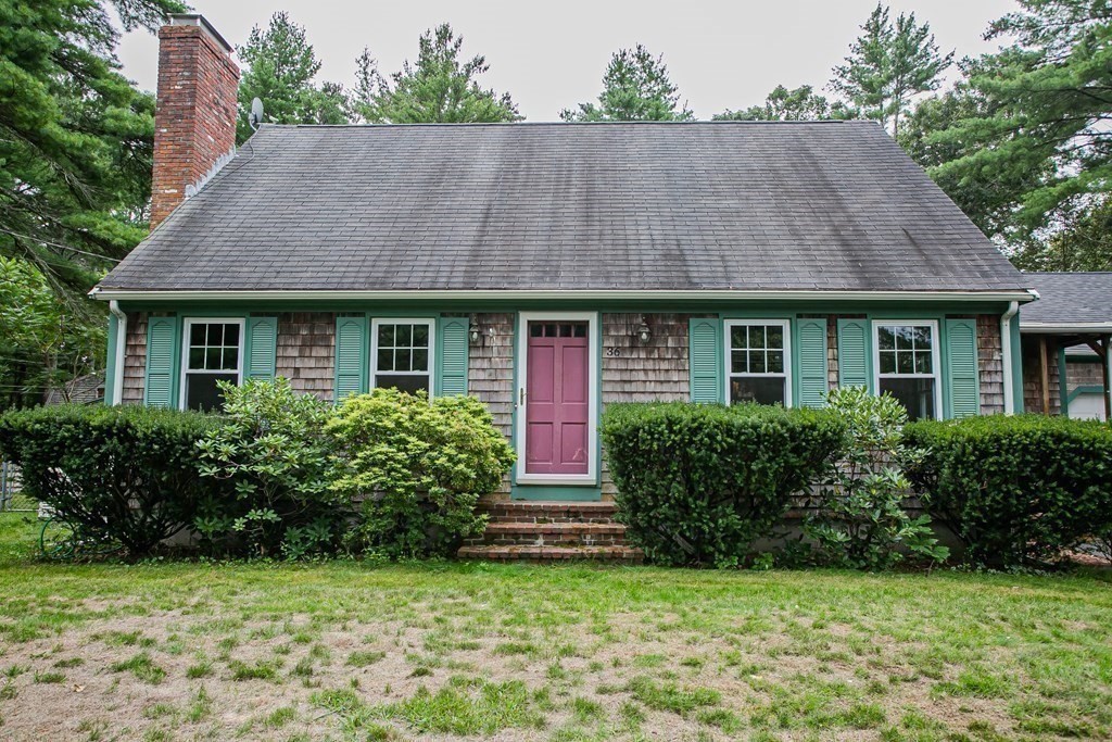 36 Morton Road Freetown, MA 02717 - Photo 4 of 40 a front view of a house with a garden