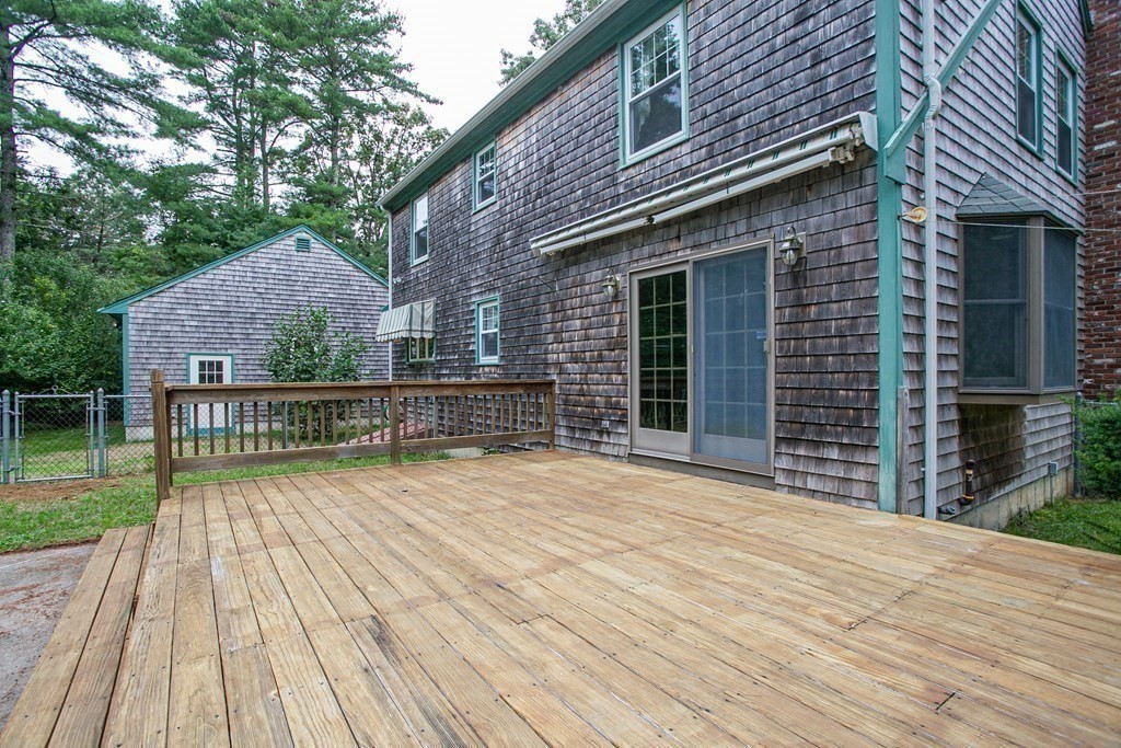 36 Morton Road Freetown, MA 02717 - Photo 10 of 40 a view of a house with wooden deck