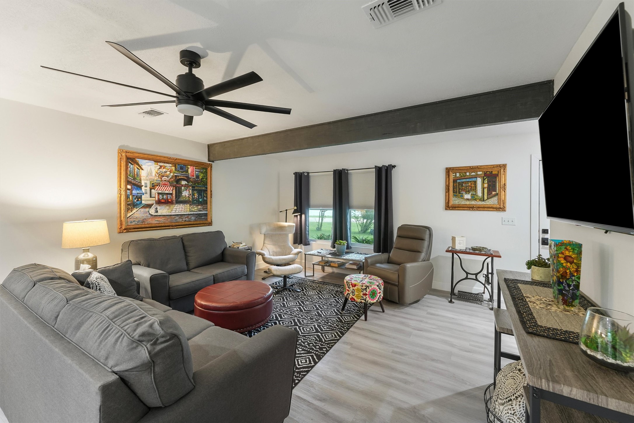 35 Bounty Palacios, TX 77465 - Photo 12 of 35 a living room with furniture a flat screen tv and a window