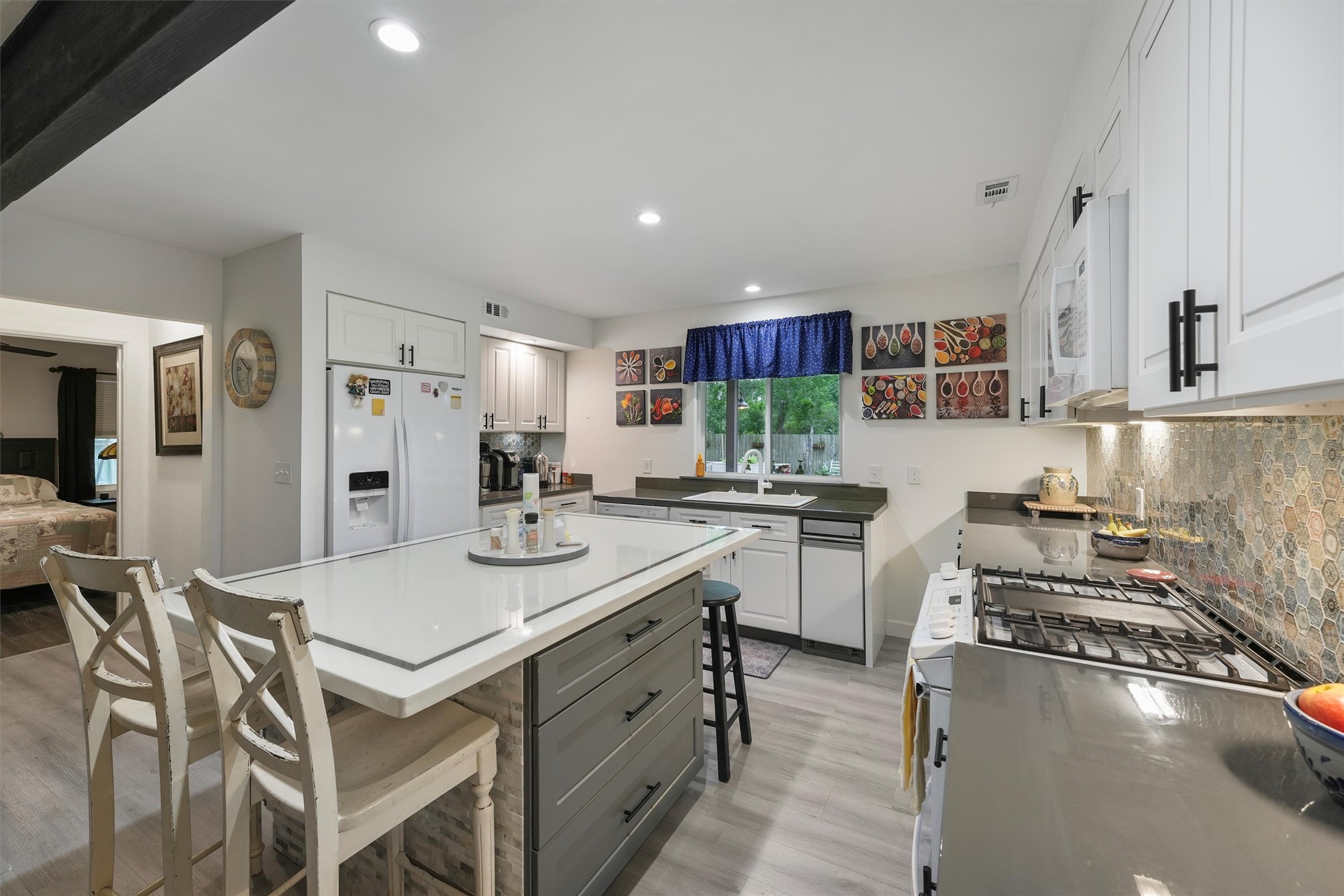 35 Bounty Palacios, TX 77465 - Photo 13 of 35 a kitchen with sink stove and refrigerator