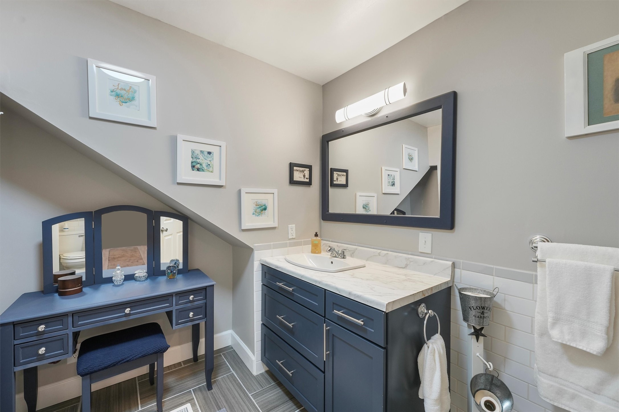 35 Bounty Palacios, TX 77465 - Photo 22 of 35 a bathroom with a sink a mirror and a vanity