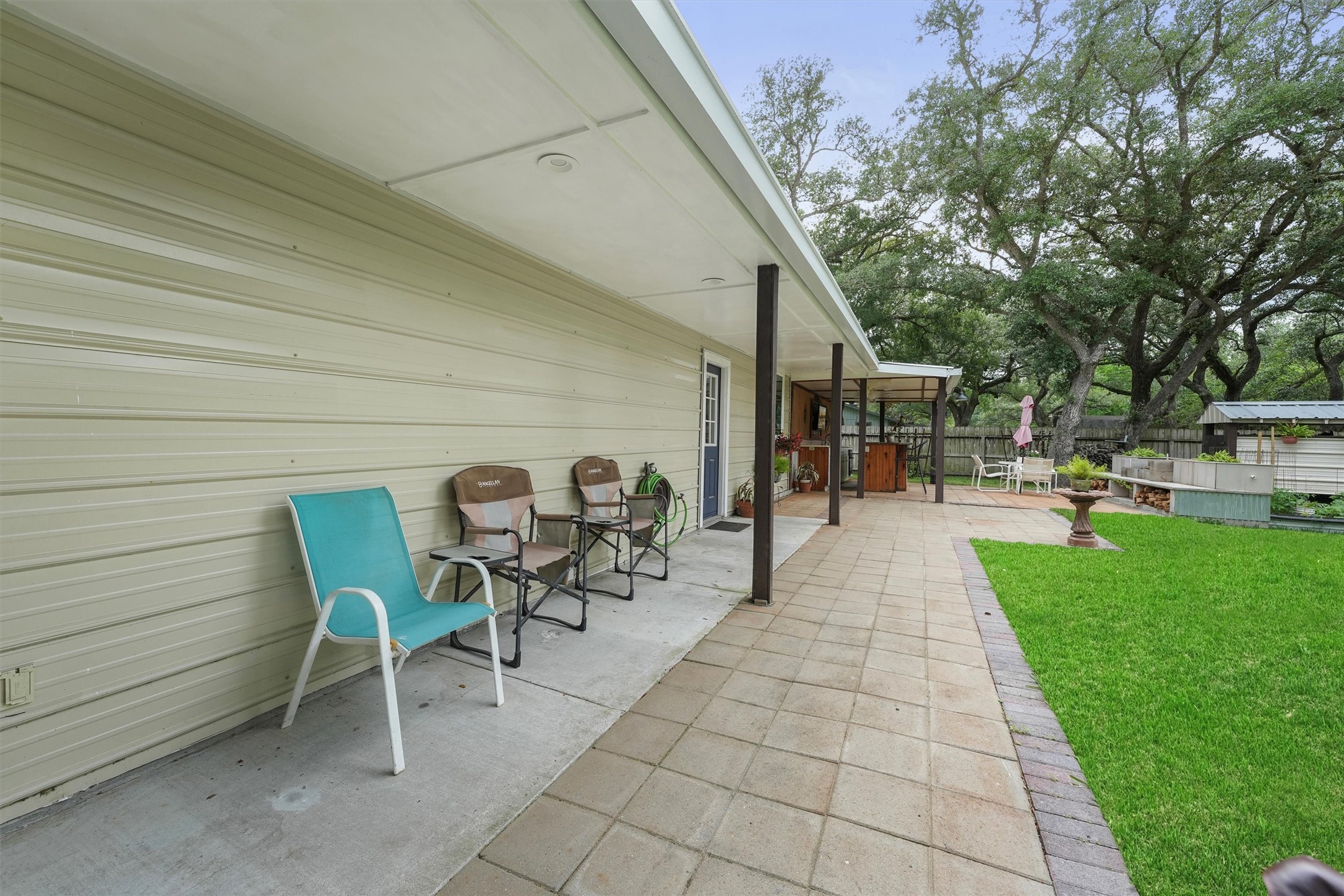 35 Bounty Palacios, TX 77465 - Photo 29 of 35 a view of a patio with table and chairs and garden
