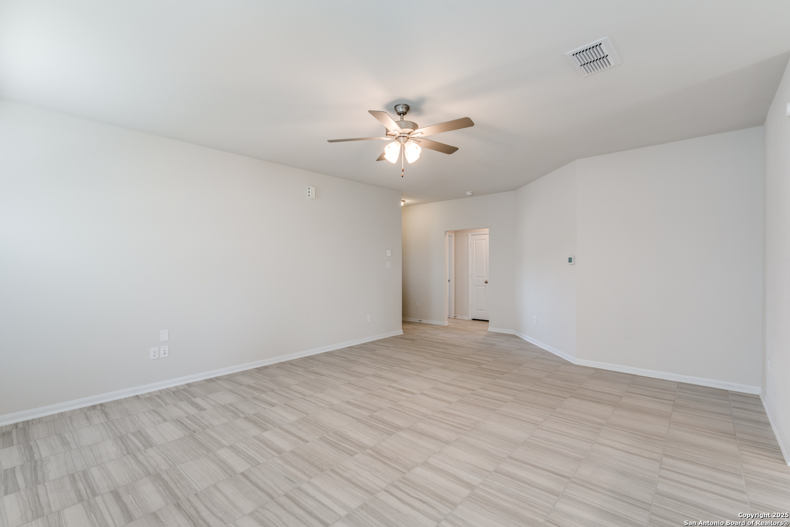 8931 Hazel Birch Elmendorf, TX 78112 - Photo 5 of 21 wooden floor in an empty room
