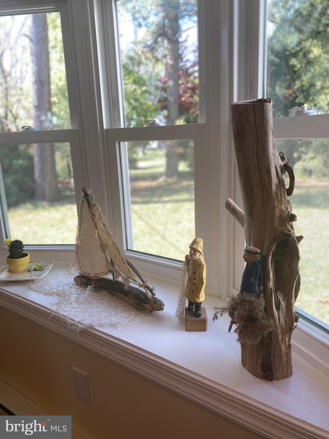 20805 Severn Road Ewell, MD 21824 - Photo 24 of 27 a room with a window and potted plant