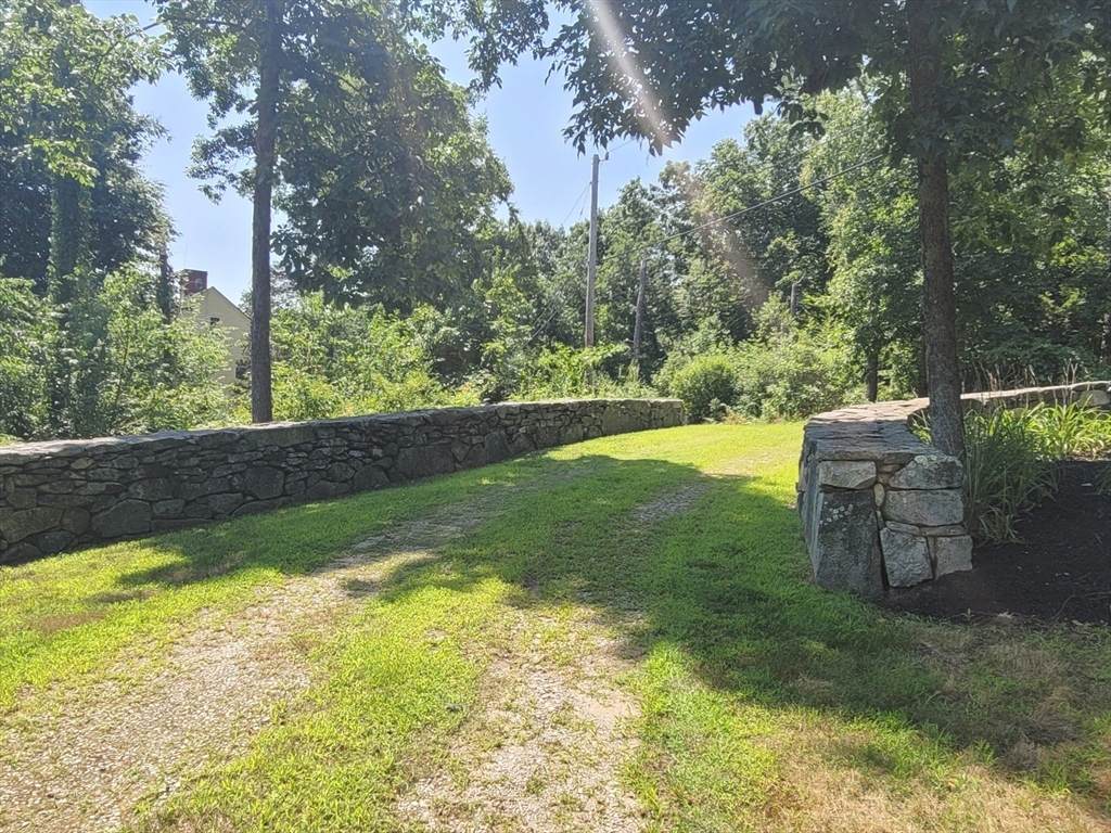 0 Old Dunstable Road Groton, MA 01450 - Photo 8 of 32 a view of backyard with seating area and green space
