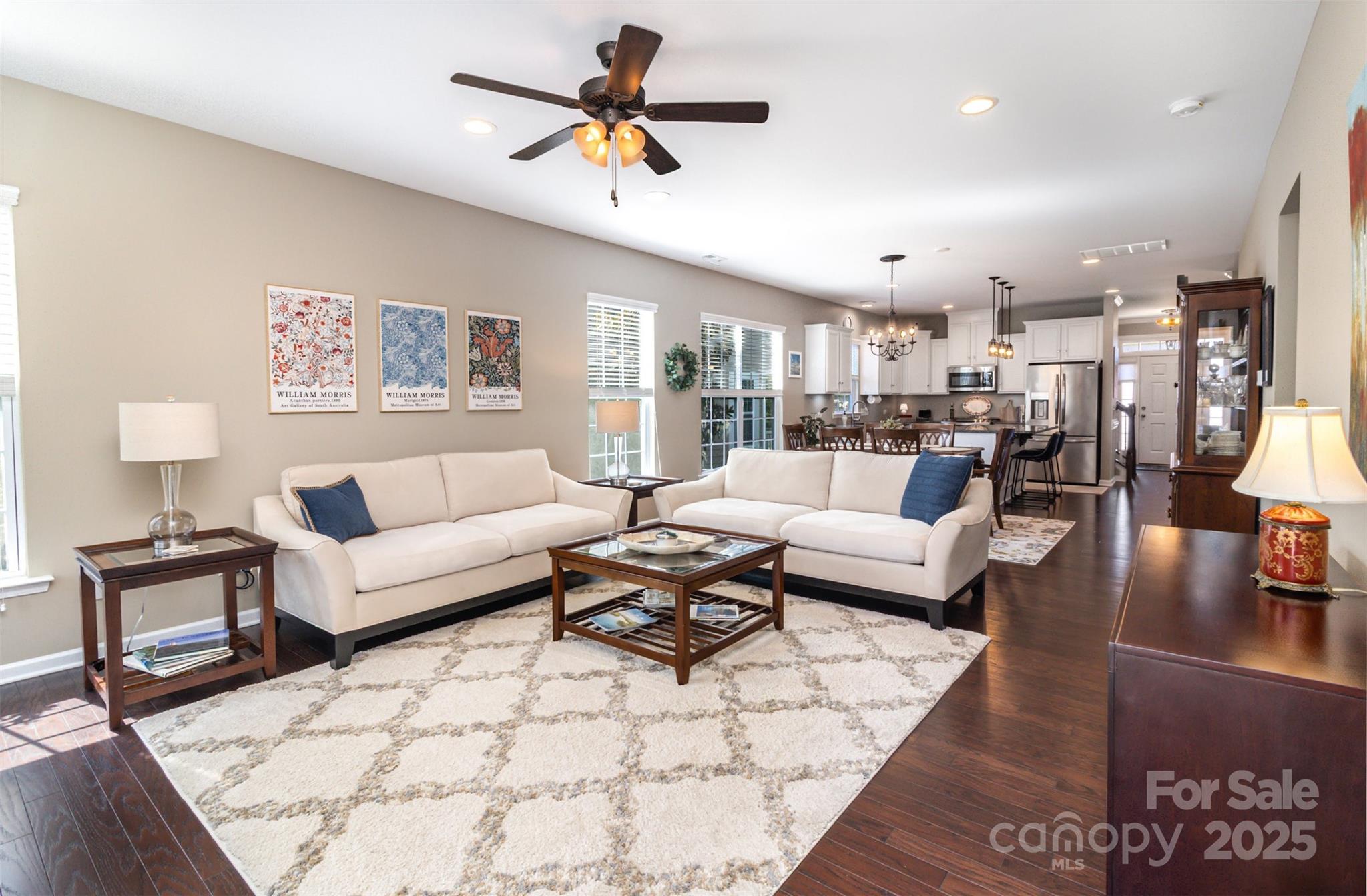 6187 Cloverdale Drive Tega Cay, SC 29708 - Photo 11 of 36 a living room with furniture and a view of kitchen