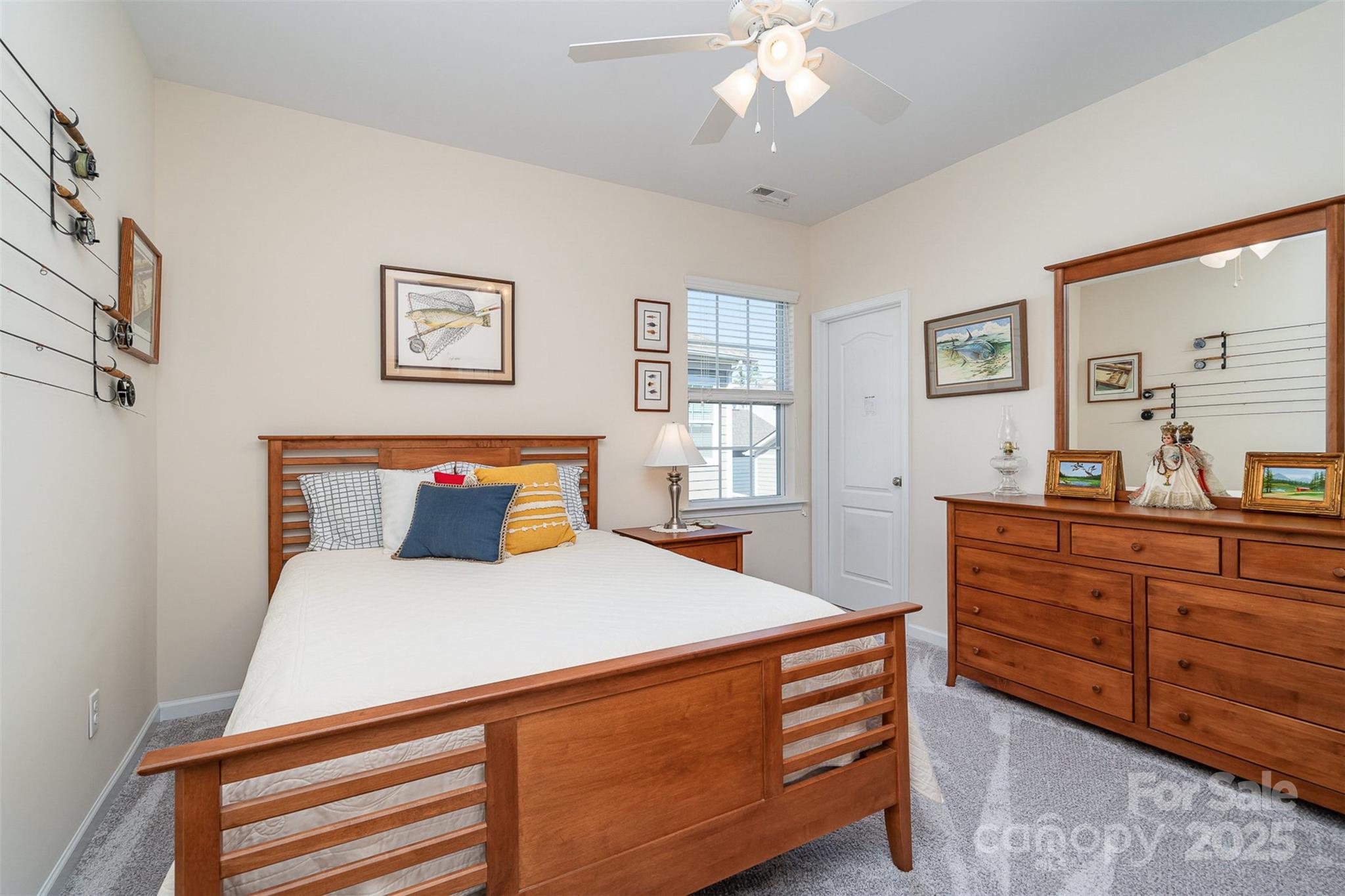6187 Cloverdale Drive Tega Cay, SC 29708 - Photo 25 of 36 a bed room with a bed and a dresser