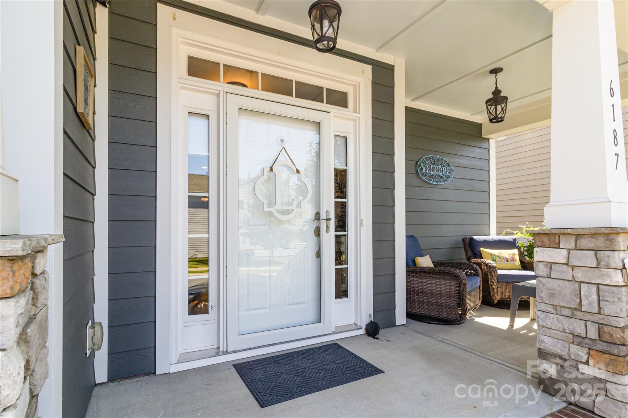 6187 Cloverdale Drive Tega Cay, SC 29708 - Photo 3 of 36 a view of front door and porch