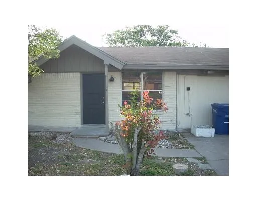 a black and white photo of a house