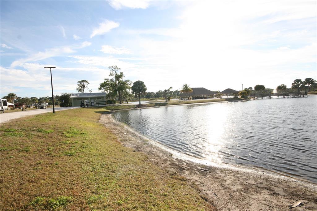 0 Highway 630 East Frostproof, FL 33843 - Photo 17 of 37 a view of a lake with houses