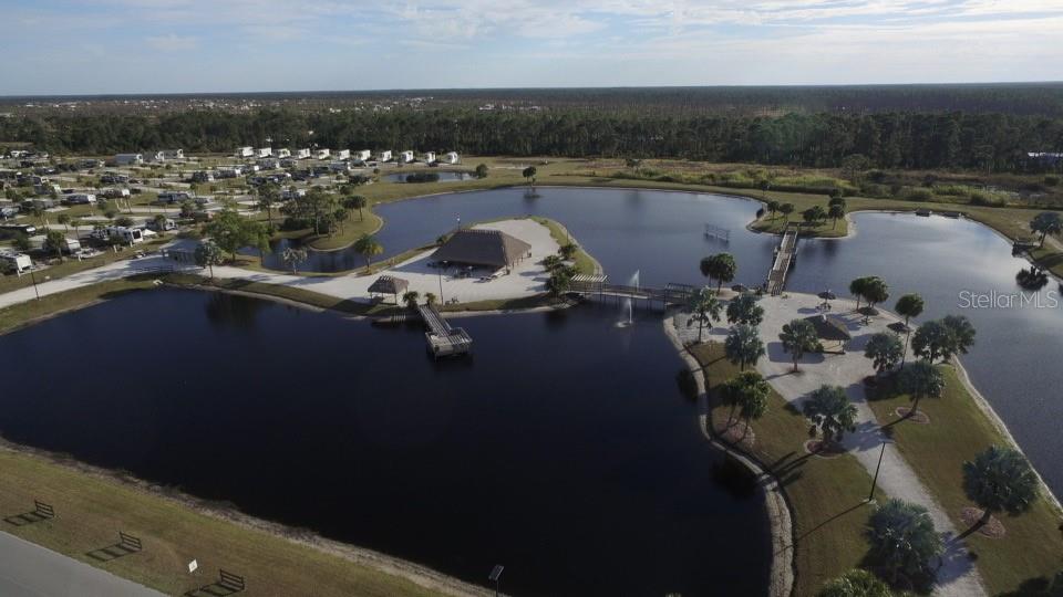 0 Highway 630 East Frostproof, FL 33843 - Photo 26 of 37 a view of a lake with outdoor space