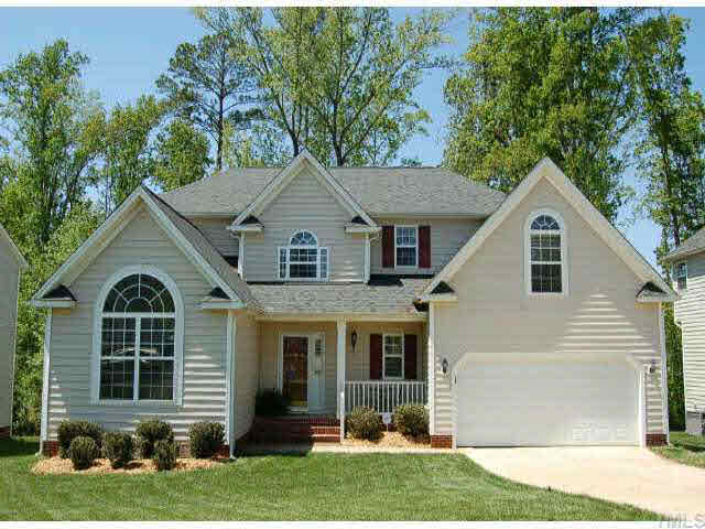 132 Mickleson Ridge Drive Raleigh, NC 27603 - Photo 1 of 10 a front view of a house with a yard