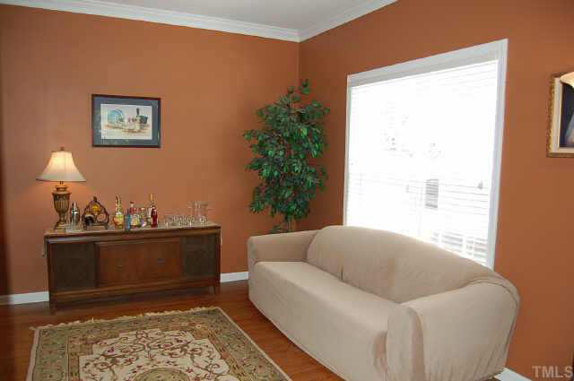 132 Mickleson Ridge Drive Raleigh, NC 27603 - Photo 4 of 10 a living room with furniture and a rug