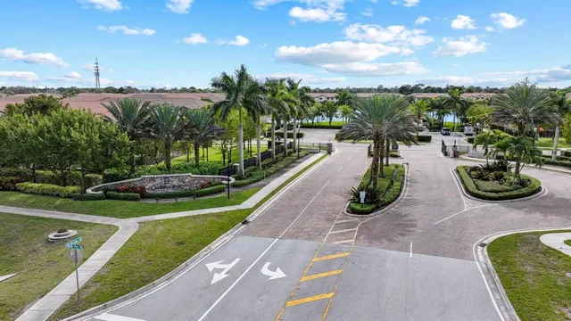 a view of a street with a garden