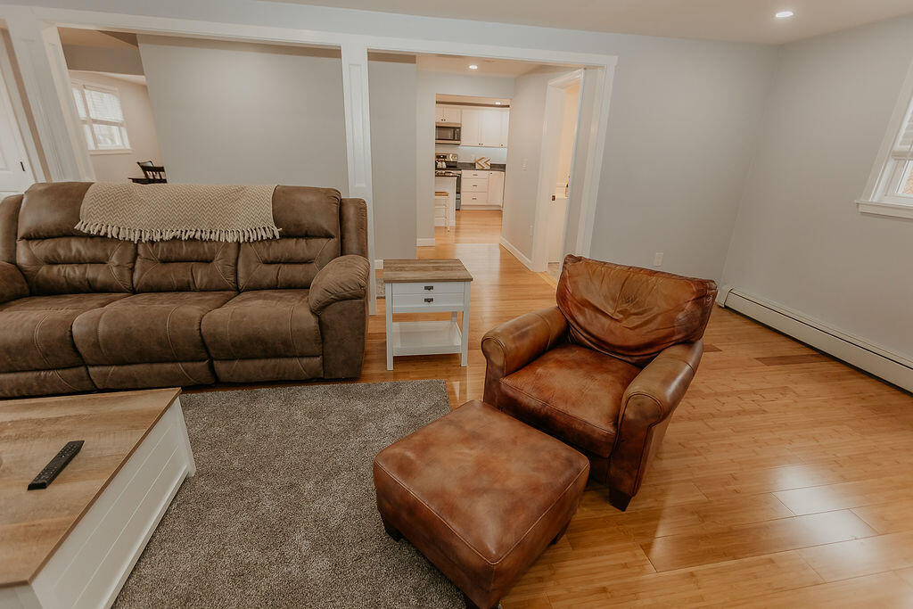 9 Rip Van Winkle Way Buzzards Bay, MA 02532 - Photo 18 of 56 a living room with furniture