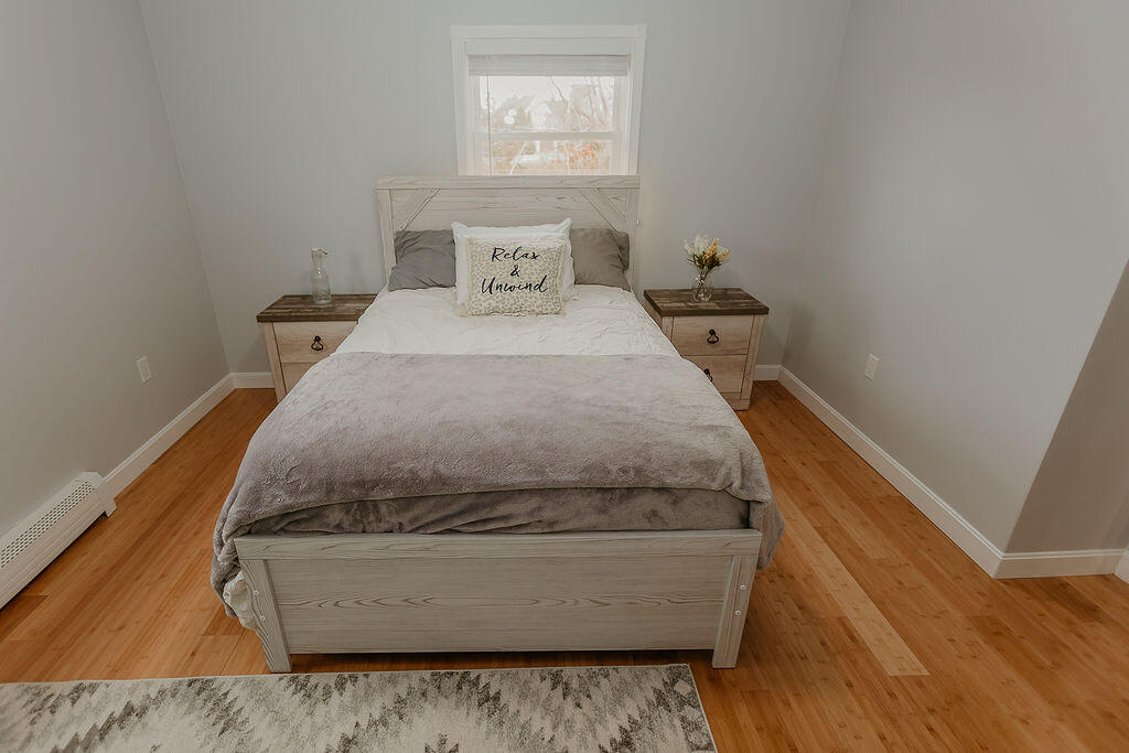 9 Rip Van Winkle Way Buzzards Bay, MA 02532 - Photo 39 of 56 a living room with a couch