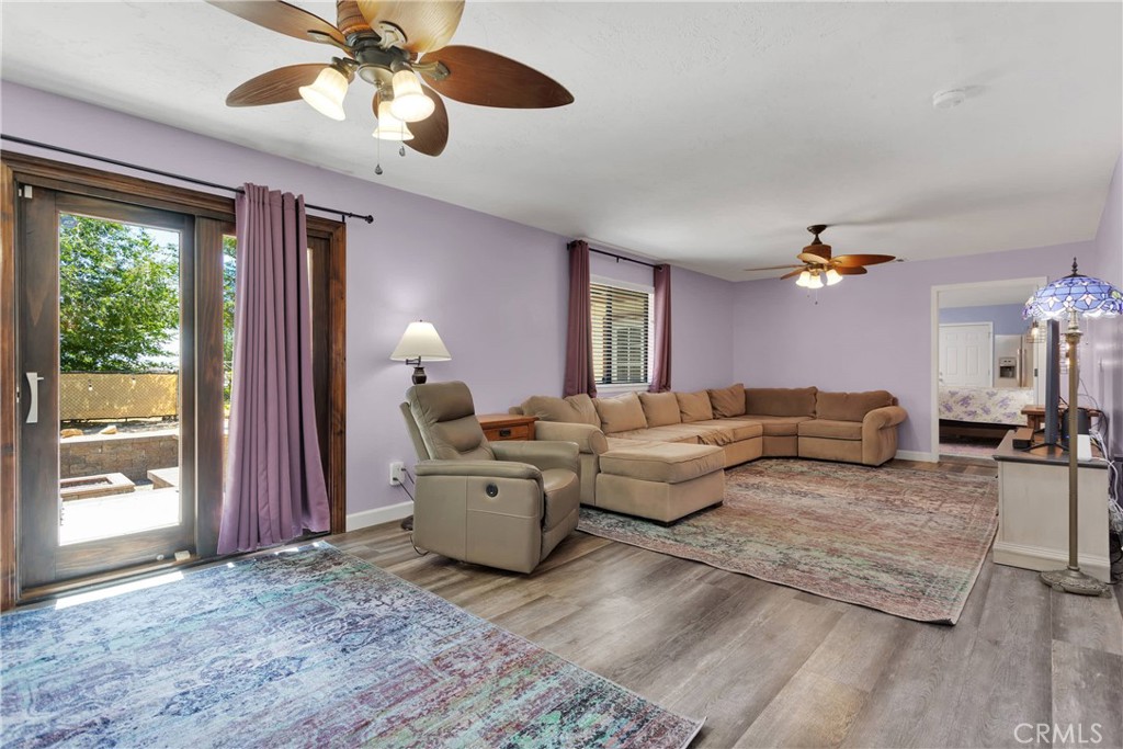 19095 Munsee Road Apple Valley, CA 92307 - Photo 12 of 58 a living room with furniture and a large window