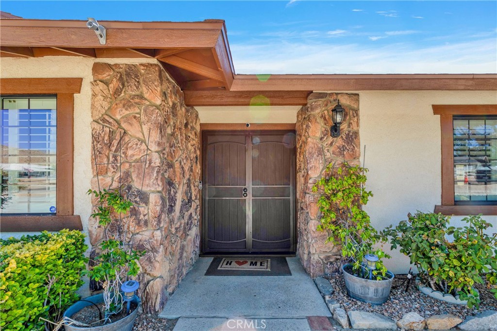 19095 Munsee Road Apple Valley, CA 92307 - Photo 2 of 58 a view of a door with an outdoor space