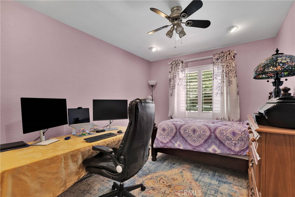19095 Munsee Road Apple Valley, CA 92307 - Photo 21 of 58 a view of a livingroom with workspace and a window