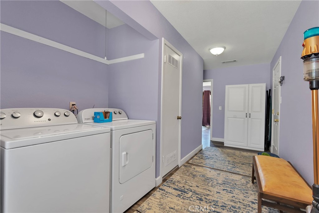 19095 Munsee Road Apple Valley, CA 92307 - Photo 33 of 58 a view of utility room with washer and dryer