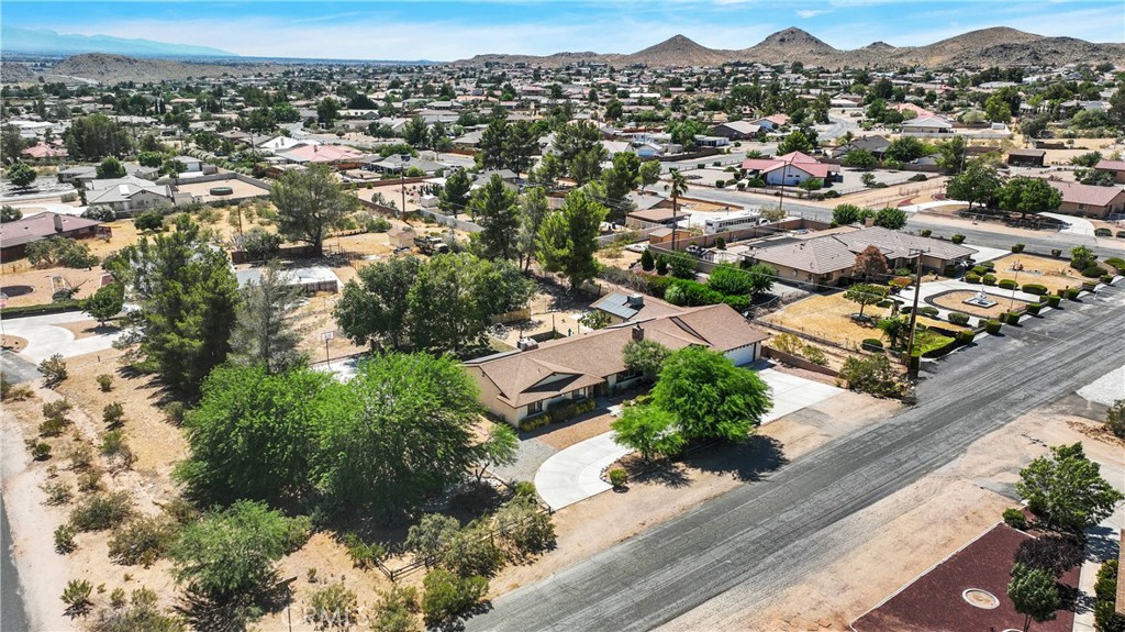 19095 Munsee Road Apple Valley, CA 92307 - Photo 35 of 58 an aerial view of residential houses with outdoor space