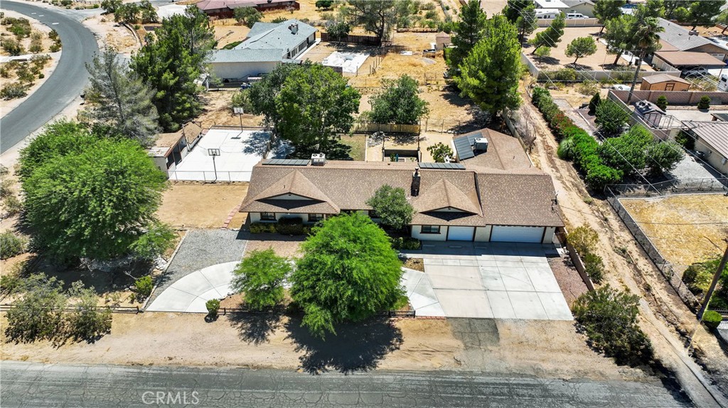 19095 Munsee Road Apple Valley, CA 92307 - Photo 47 of 58 an aerial view of residential houses with outdoor space