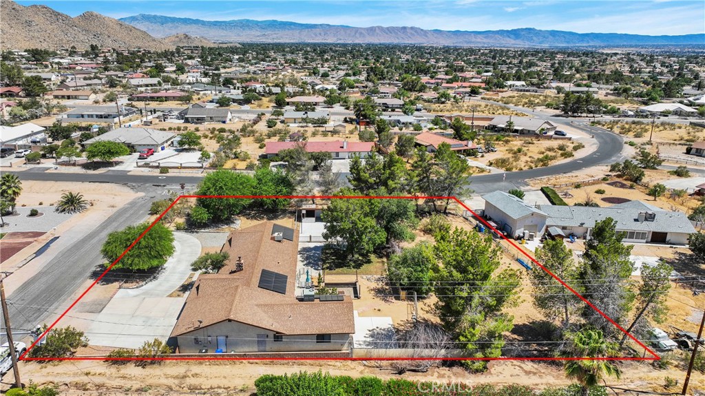 19095 Munsee Road Apple Valley, CA 92307 - Photo 54 of 58 an aerial view of residential houses with outdoor space