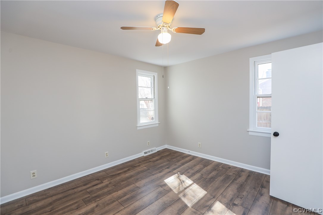 1355 Robindale Road Richmond, VA 23235 - Photo 11 of 35 wooden floor in an empty room with a window