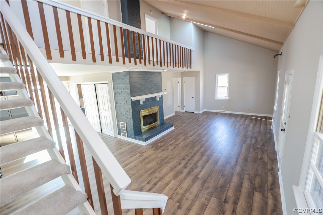 1355 Robindale Road Richmond, VA 23235 - Photo 18 of 35 a view of a livingroom with wooden floor and staircase