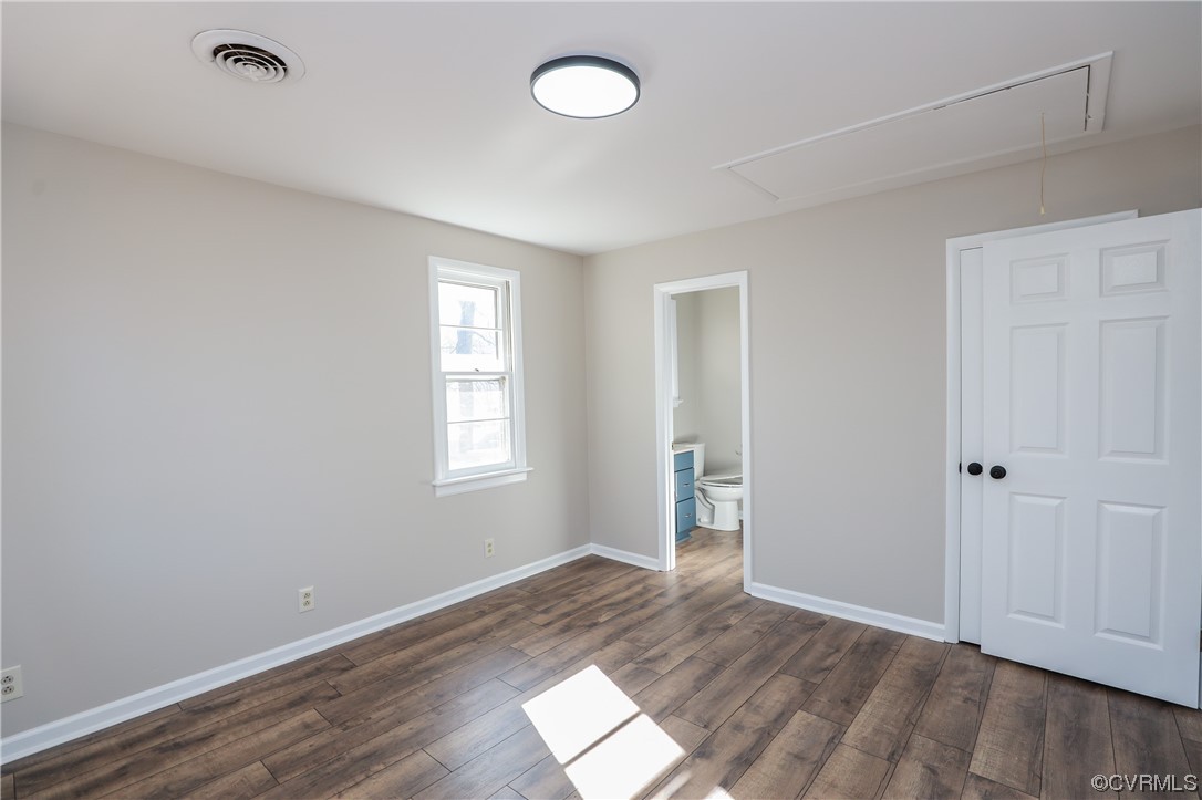 1355 Robindale Road Richmond, VA 23235 - Photo 25 of 35 an empty room with wooden floor and windows