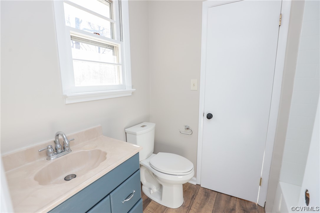 1355 Robindale Road Richmond, VA 23235 - Photo 27 of 35 a bathroom with a sink toilet and vanity
