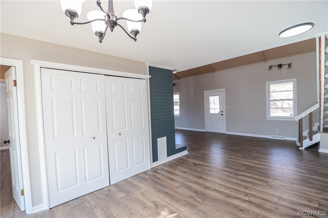 1355 Robindale Road Richmond, VA 23235 - Photo 28 of 35 a view of an empty room with wooden floor and a window