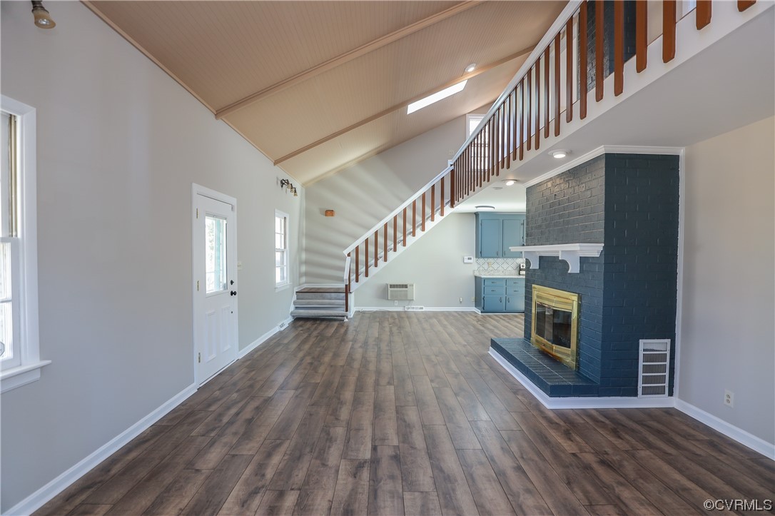 1355 Robindale Road Richmond, VA 23235 - Photo 6 of 35 a view of entryway and hall with wooden floor