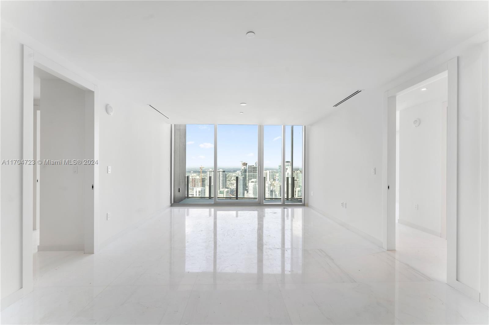 300 Biscayne Blvd Way, Unit 5209 Miami, FL 33131 - Photo 2 of 42 a view of an empty room with a window