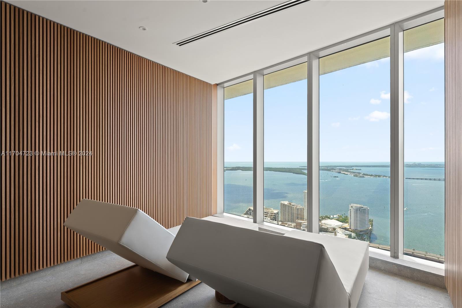 300 Biscayne Blvd Way, Unit 5209 Miami, FL 33131 - Photo 32 of 42 a room with a bed and a large window