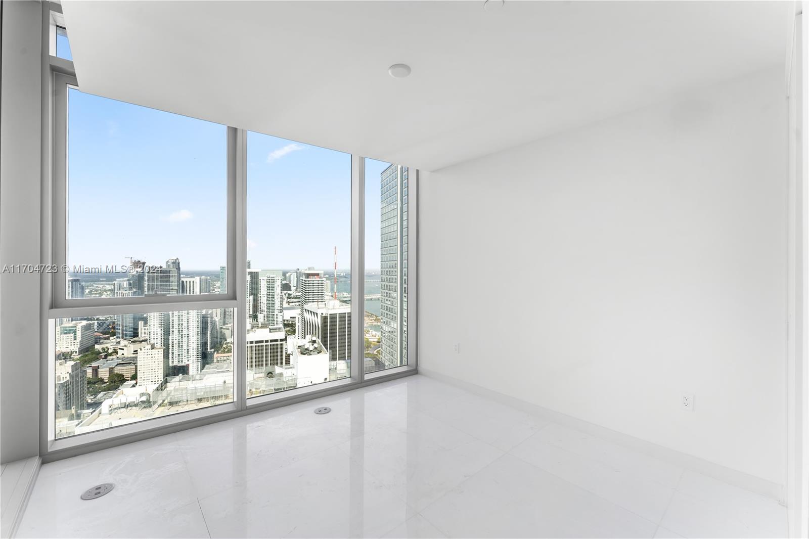 300 Biscayne Blvd Way, Unit 5209 Miami, FL 33131 - Photo 9 of 42 a view of a room with a large window