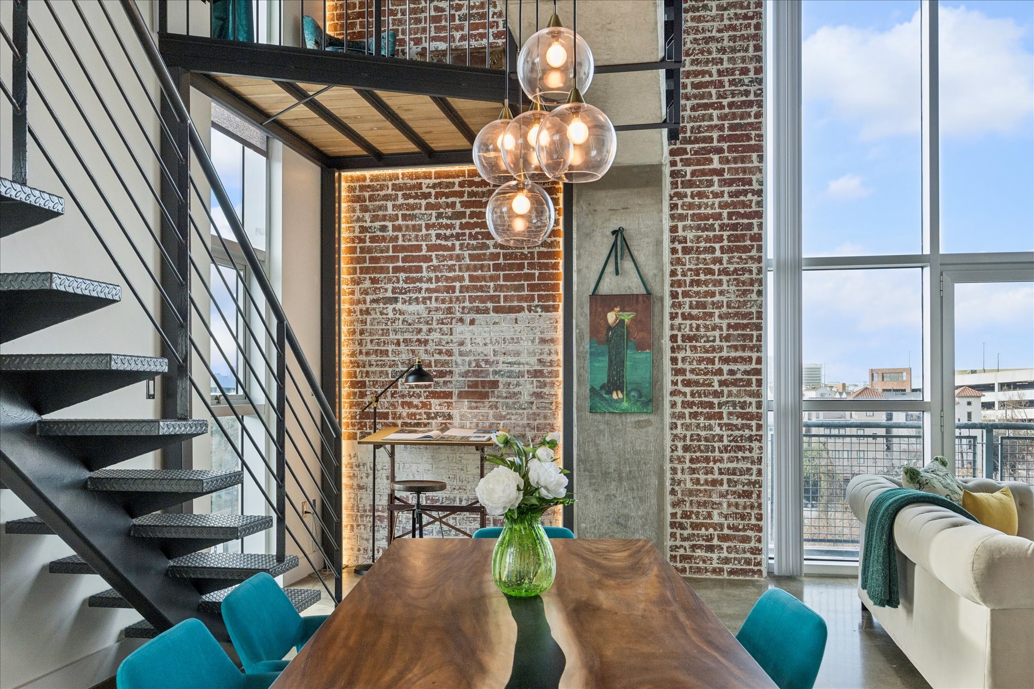 2000 Bagby Street, Unit 5400 Houston, TX 77002 - Photo 9 of 47 Designer lighting layered throughout the home, chandeliers, pendants, sconces, accent. LED backlit exposed aged brick feature wall.