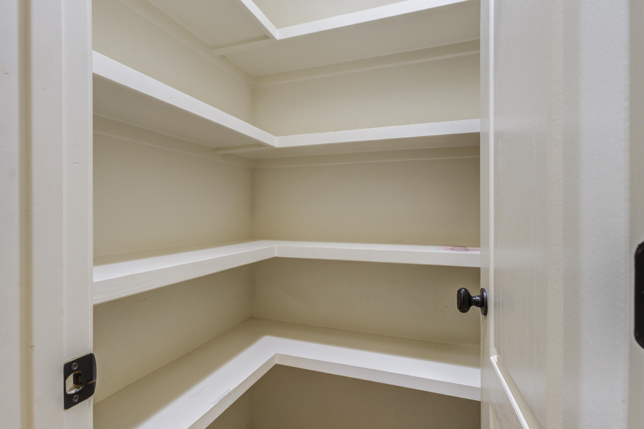 6512 71st Street Lubbock, TX 79424 - Photo 20 of 41 a empty closet with white paint