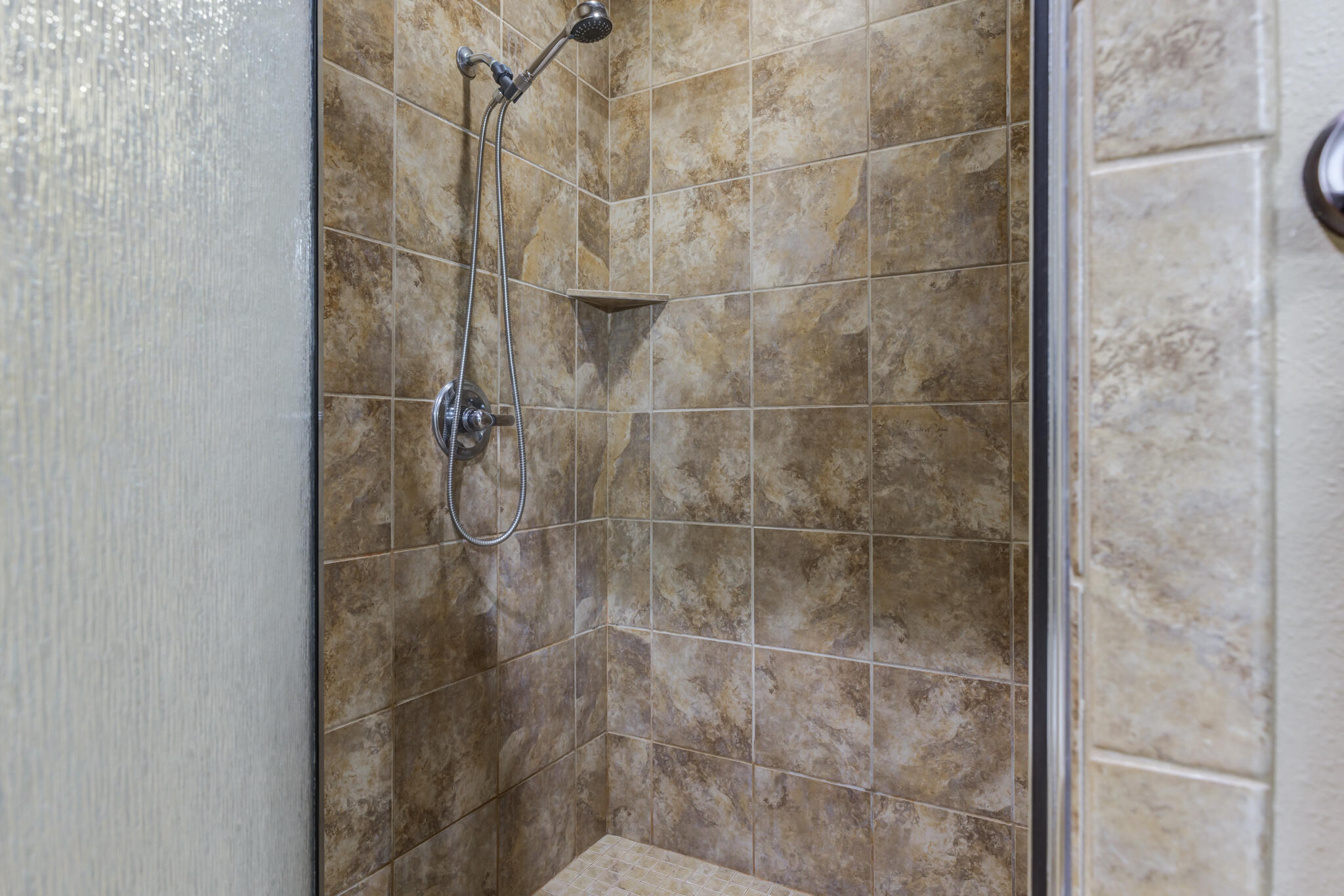 6512 71st Street Lubbock, TX 79424 - Photo 27 of 41 a bathroom with a shower