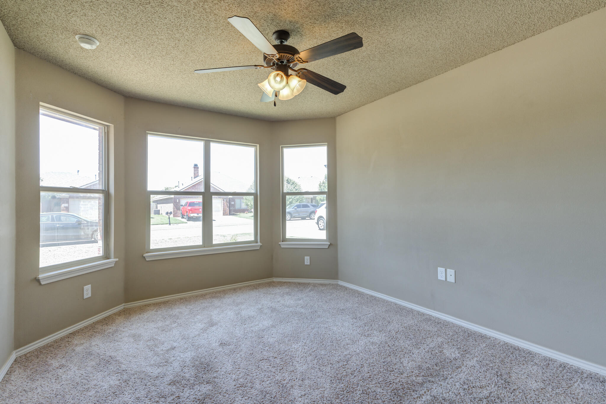 6512 71st Street Lubbock, TX 79424 - Photo 29 of 41 a view of an empty room with a window