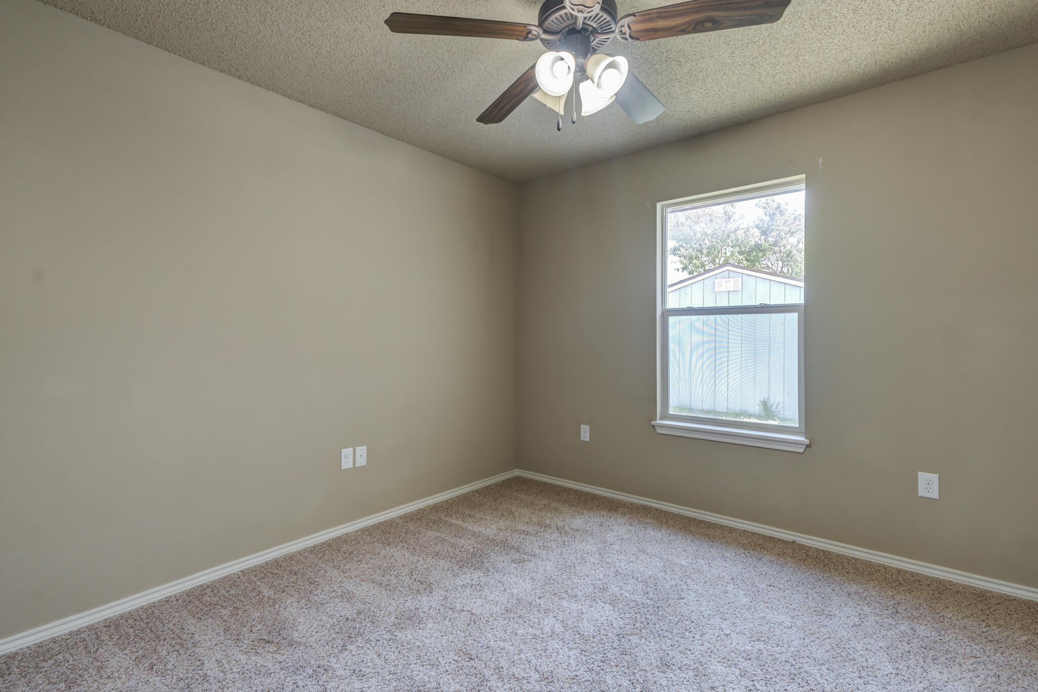 6512 71st Street Lubbock, TX 79424 - Photo 33 of 41 an empty room with a window