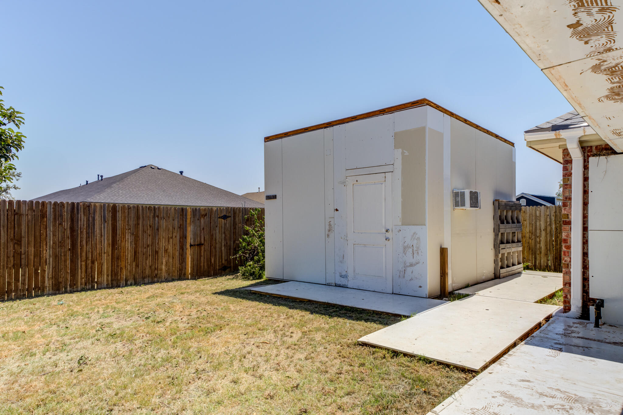 6512 71st Street Lubbock, TX 79424 - Photo 39 of 41 a view of a house with a backyard