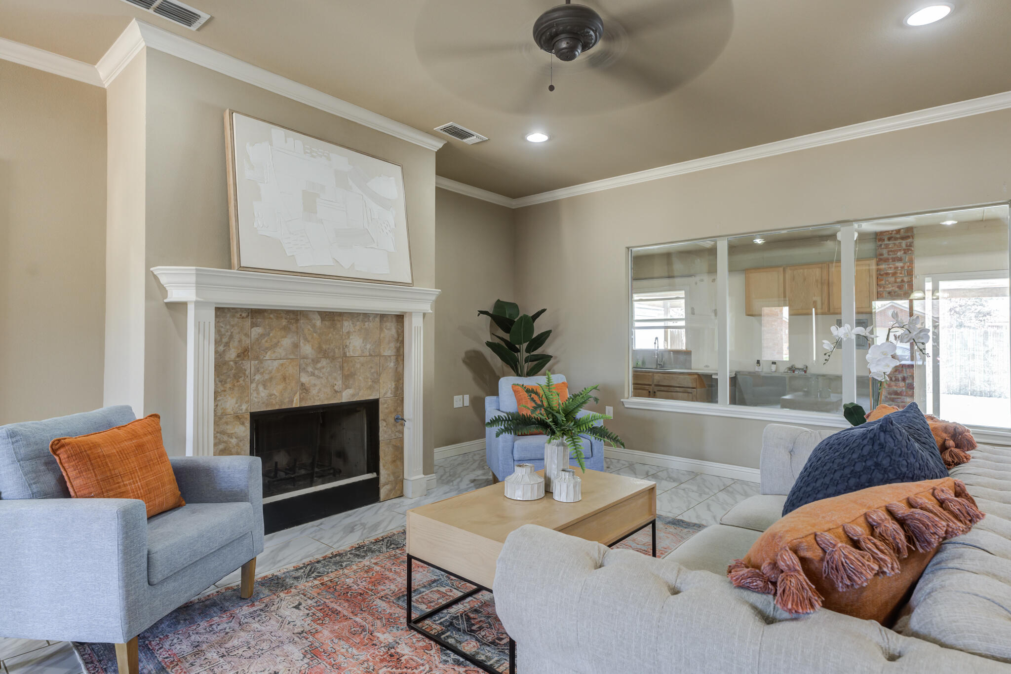 6512 71st Street Lubbock, TX 79424 - Photo 8 of 41 a living room with furniture and a fireplace