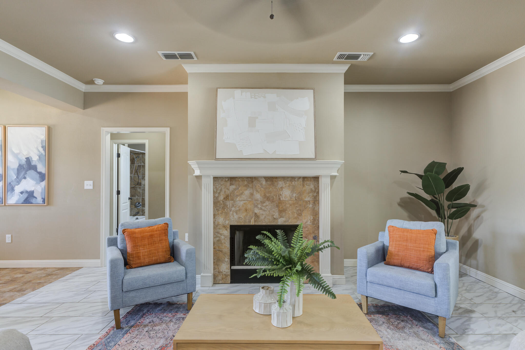6512 71st Street Lubbock, TX 79424 - Photo 9 of 41 a living room with furniture and a fireplace