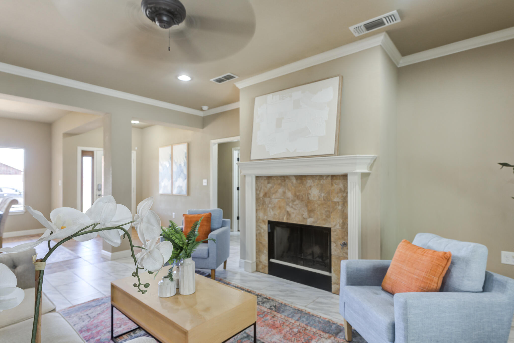6512 71st Street Lubbock, TX 79424 - Photo 10 of 41 a living room with furniture and a fireplace