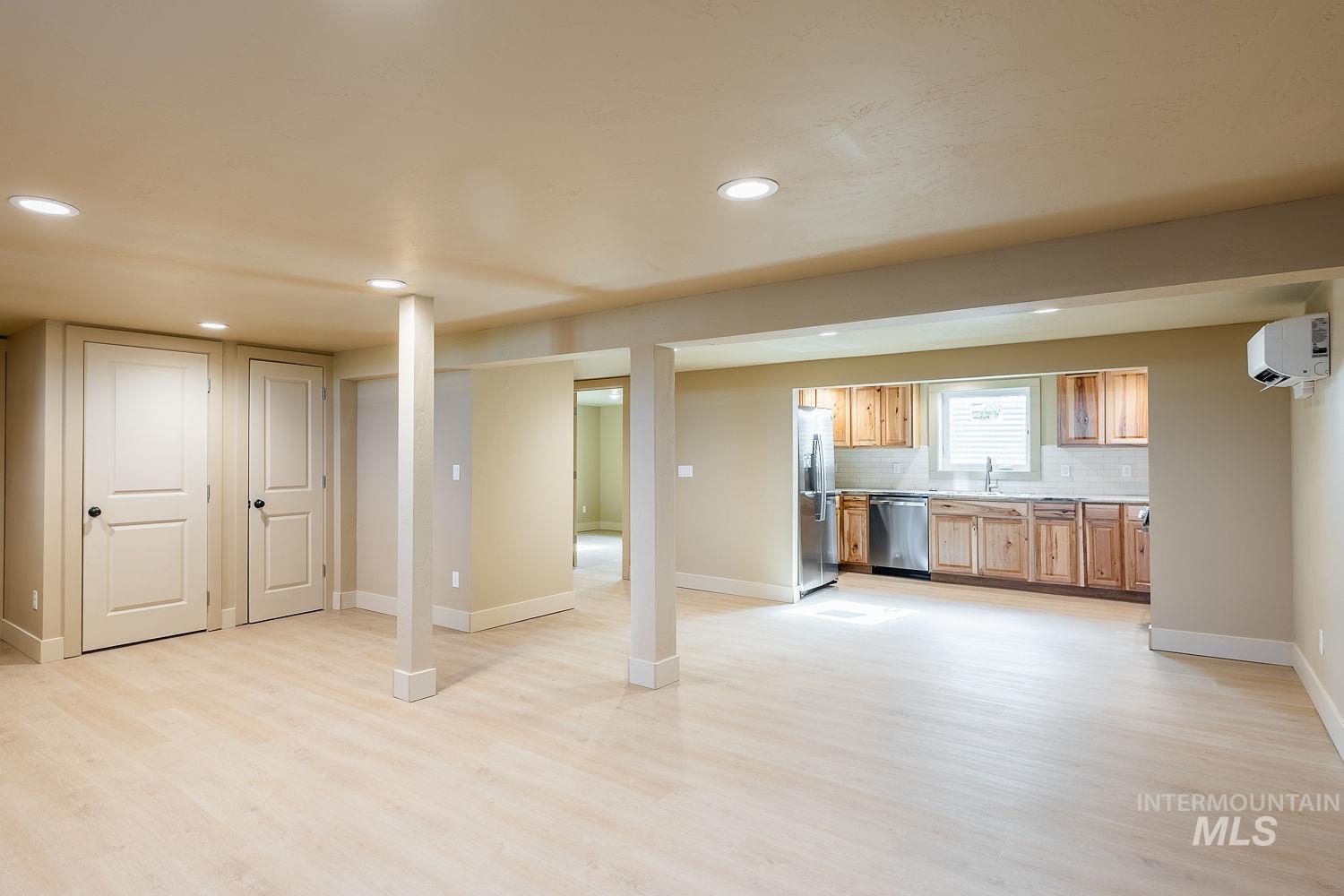 11171 Pump Road Nampa, ID 83686 - Photo 37 of 50 Open-concept lower level featuring light wood-finish flooring, recessed lighting, and neutral wall tones