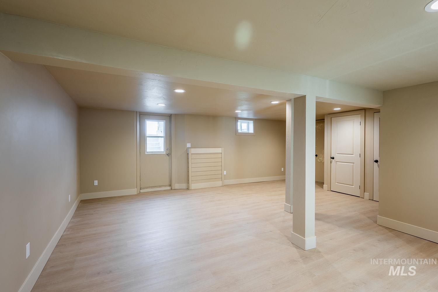 11171 Pump Road Nampa, ID 83686 - Photo 38 of 50 Spacious lower level featuring light wood-finish flooring, recessed lighting, and neutral wall tones