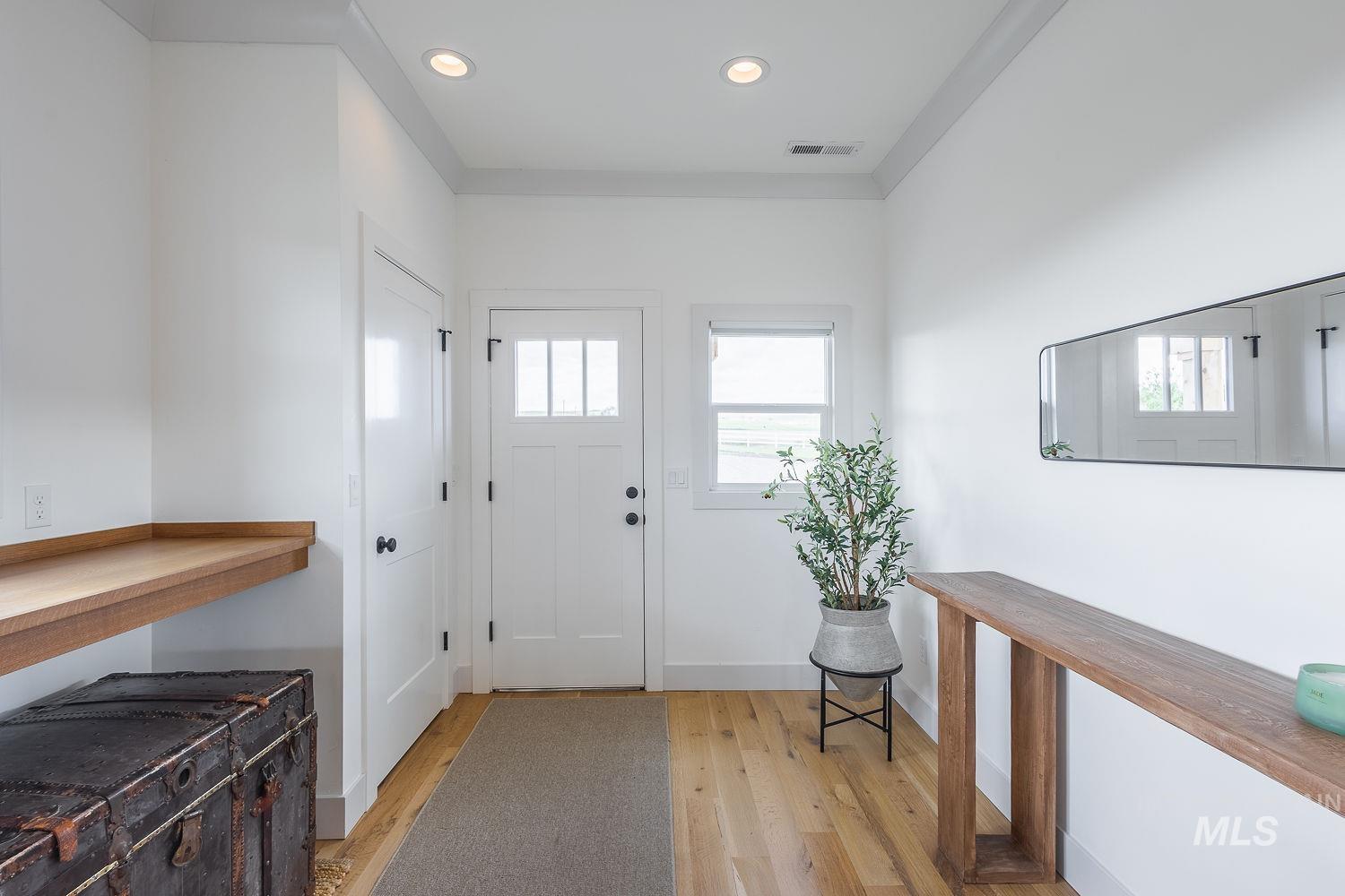 11171 Pump Road Nampa, ID 83686 - Photo 6 of 50 Entryway featuring wood-finish flooring, white walls, and recessed lighting