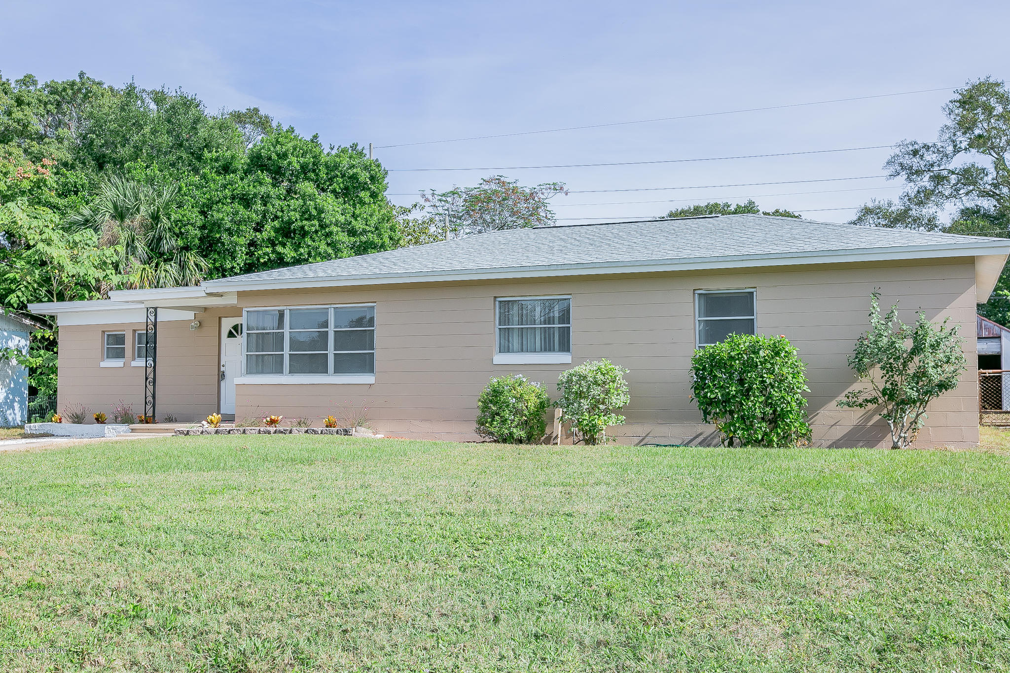 2418 Cherbourg Road Cocoa, FL 32926 - Photo 3 of 26 Front